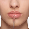 Tinted Lip Gloss Trio - Lip Gloss Wand On Model