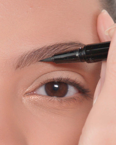Applying Brow Pen in Dark Brown